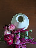 locaflora local flower arrangement dried pink flowers with handmade ceramic vase by Courtney billow